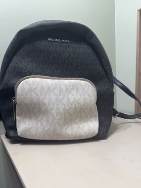 Michael Kors Black Backpack with White Front Pocket